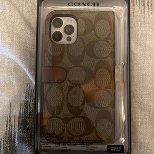 A Coach phone/wallet case. IPhone 12 Pro Max